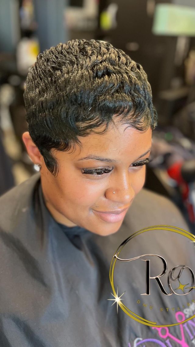 Clean pixie cut with sculpted waves, fresh from the chair