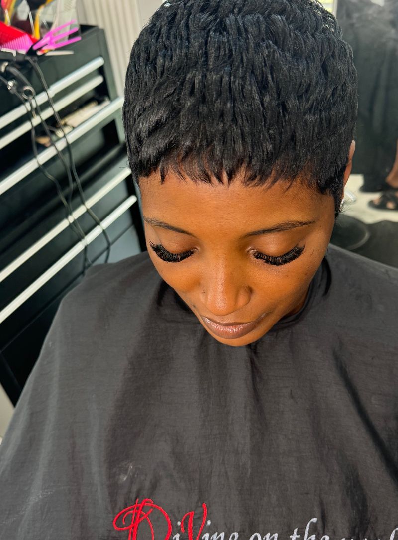 Clean pixie cut from above, fresh out of the chair